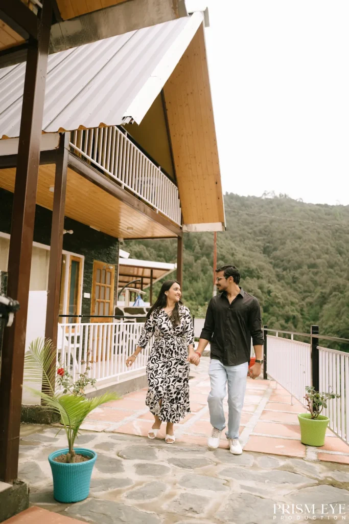 Couple walking together outside a resort in Lokhandi, Chakrata
