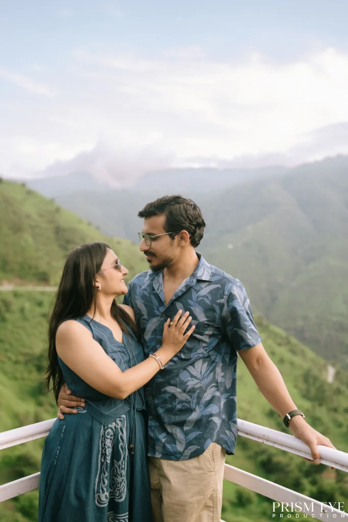 Couple enjoying a scenic mountain view in Koti, Chakrata