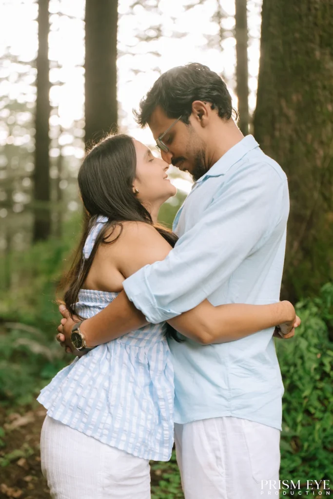 Romantic couple embracing in a deodar forest in Chakrata