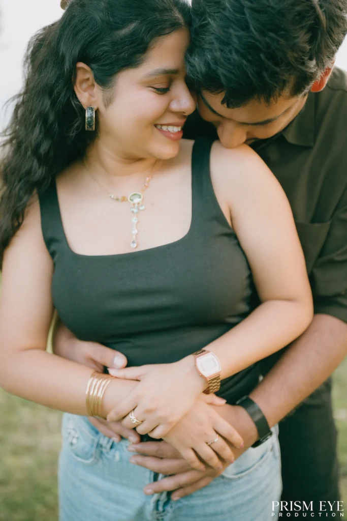 A couple sharing a tender kiss while holding each other close