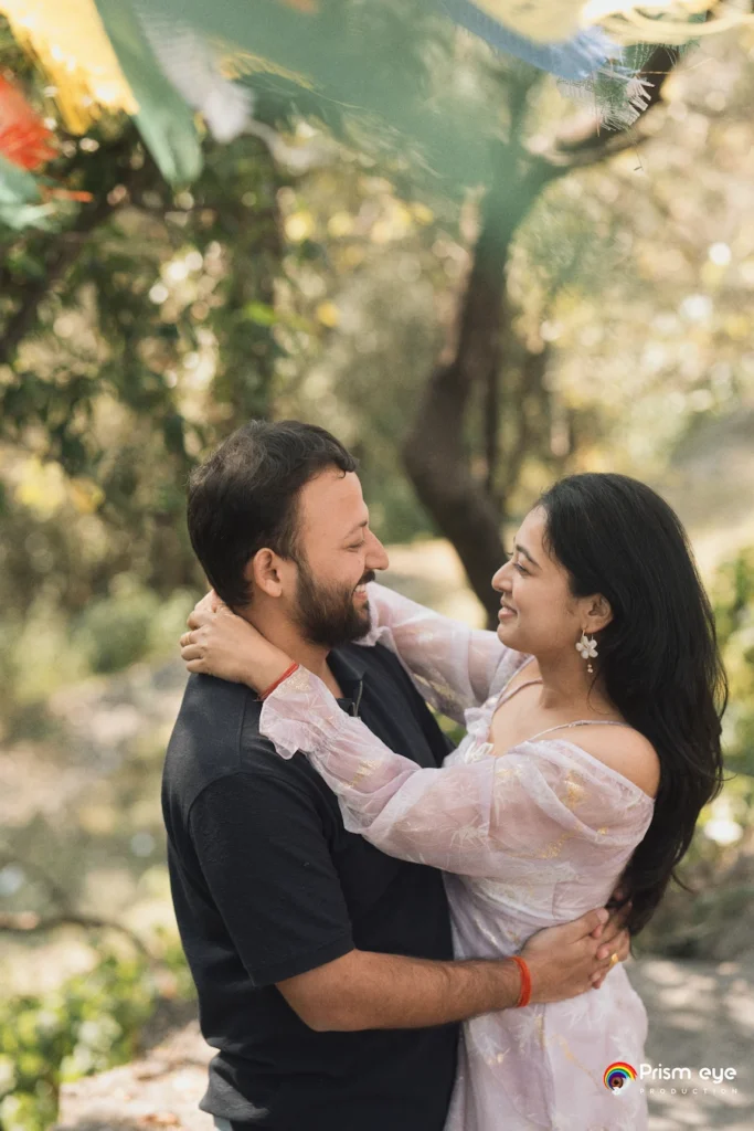 Couple sharing a candid moment during a pre-wedding shoot.