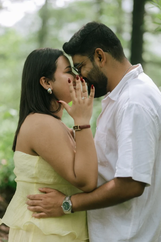 A couple sharing a sweet and intimate moment together outdoors