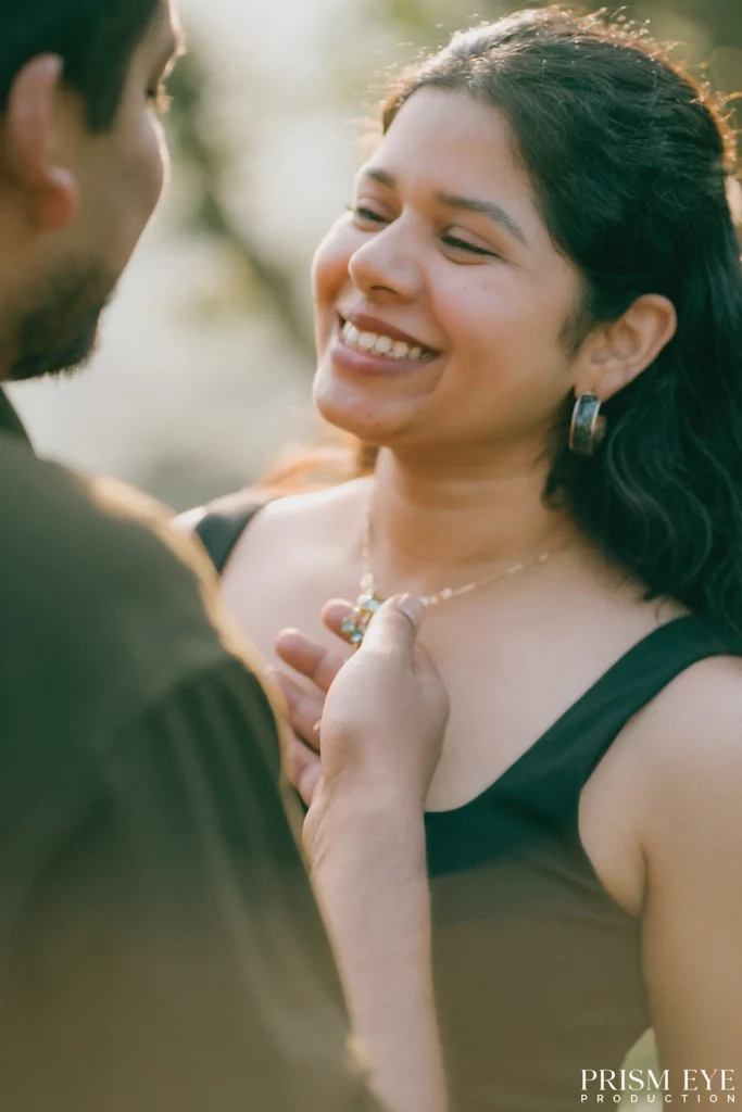 A woman smiling warmly at her partner during a quiet moment