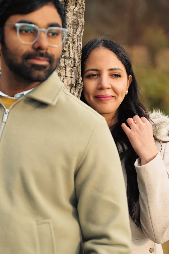 Couple sharing a candid moment outdoors.