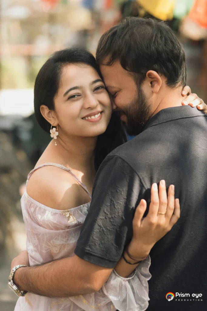 Romantic couple embracing outdoors.
