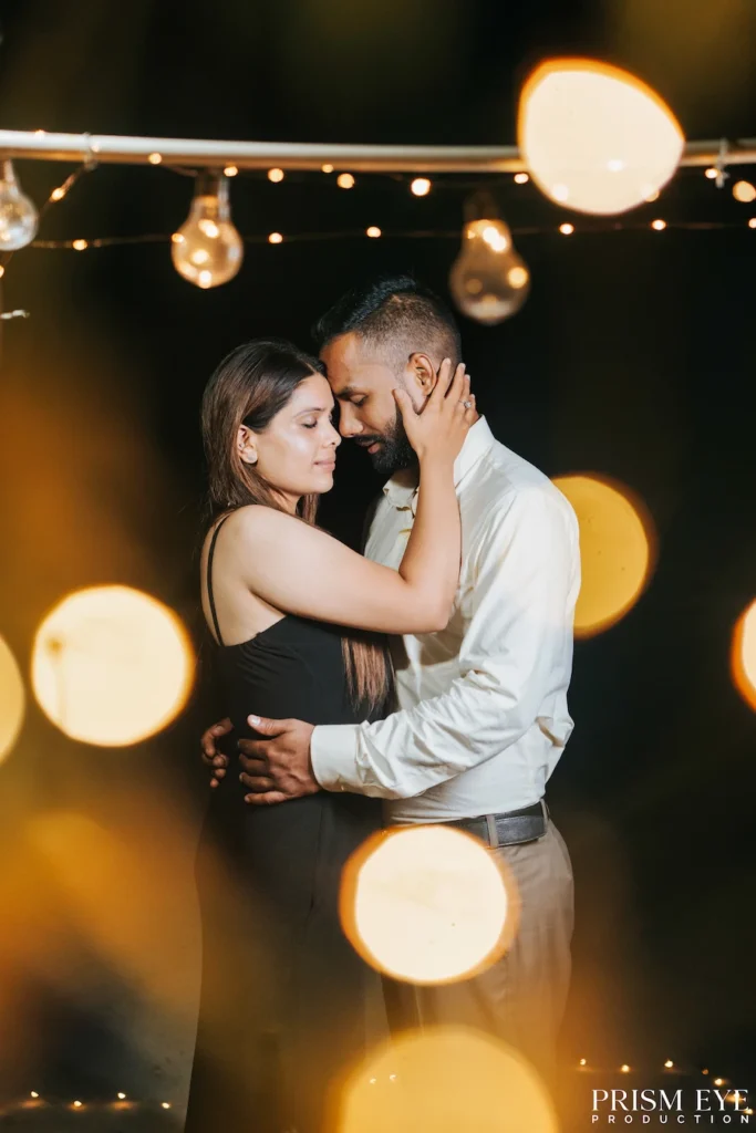 Couple embracing during a romantic indoor proposal shoot in Rishikesh.
