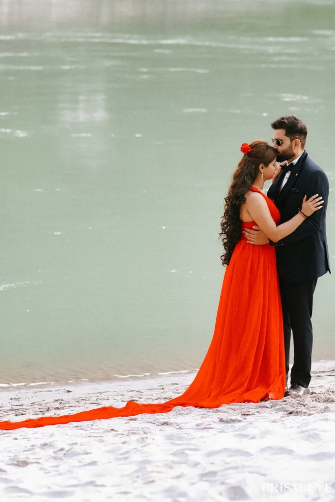 Couple embracing by the Ganga beach in Shivpuri, Rishikesh